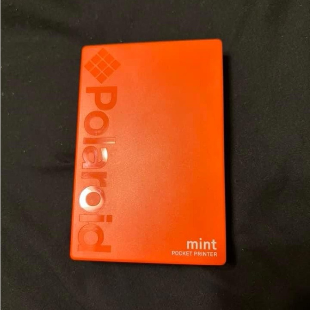Polaroid mint digital printer. Use an app on your phone, prints small stickers